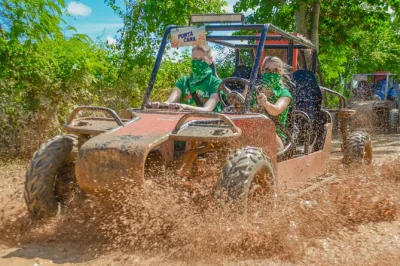 Feel the rush of driving your own buggy in punta cana, splash at macao beach, swim in a cave, and taste local coffee. includes pickup and local guide.