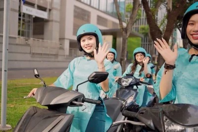 Ride through saigon on a motorbike with student guides, explore french architecture, hidden alleys, vibrant markets, and enjoy a snack—includes pickup and helmet.