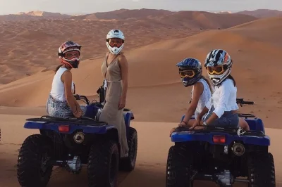 Feel the thrill of dubai’s red dunes with dune bashing, camel rides, and a bbq dinner under the stars. includes pickup, live shows, and optional quad biking.