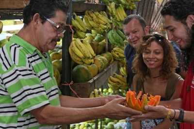 Sample tamales, fresh fruits, ice cream and costa rican coffee on a san jose walking food tour with hands-on cooking and small group size. includes tastings.