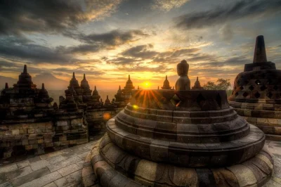 Wake up early for borobudur sunrise views, ride a jeep on merapi volcano, and explore prambanan temple—all with tickets, pickup, and a local guide included.