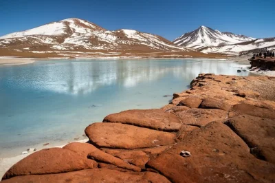 Wake up in san pedro de atacama and set out for a day of flamingos at chaxa lagoon, the red rocks of piedras rojas, and high-altitude lagoons. includes breakfast, lunch & entry fees.