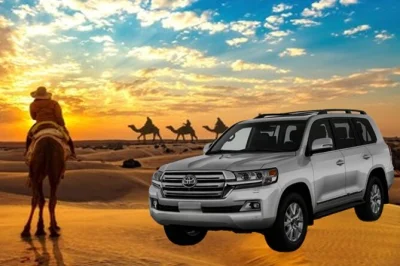 Feel the early desert air on a sunrise safari from doha with dune bashing, optional camel ride, bonfire, and breakfast. includes hotel pickup and local driver.