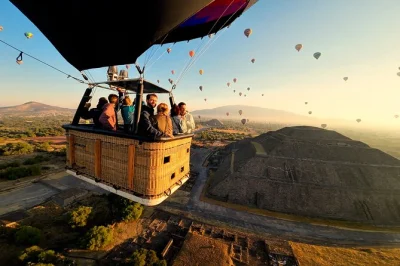 Float above teotihuacan’s pyramids at sunrise, then share a cave breakfast with local flavors and stories. includes pickup, guided flight, and free time to explore.
