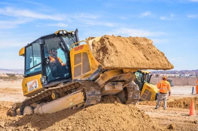 Feel the rumble of real bulldozers in las vegas, dig and push dirt with pro guidance, and earn a certificate—includes safety gear and orientation, book ahead.