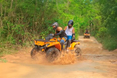 Feel the rush of jungle trails near tulum on atvs, soar by zipline, and cool off in a hidden cenote. includes mexican lunch and roundtrip transfer from meeting points.