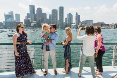 Step onto a 1920s-style yacht for a relaxed boston harbor cruise with skyline views, historic ships, and light narration. includes climate-controlled cabin & bar.