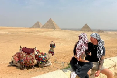 Step onto the giza plateau with a private egyptologist, go inside a pyramid, ride camels by the sphinx, and enjoy lunch—includes hotel pickup and all tickets.
