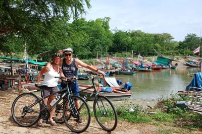 Feel the breeze on a dolphin bay & khao kalok bike tour near hua hin, stopping at fishing villages, temples, and mangroves. includes support van & lunch.