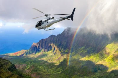 Feel the wind on a doors-off helicopter flight over kauai, with na pali coast cliffs, waimea canyon colors, and mt. waialeale’s mist. includes all fees.