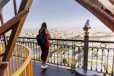 Feel the thrill of reserved entry to the eiffel tower, guided stories from a paris local, and panoramic city views. includes lift access & time to explore solo.
