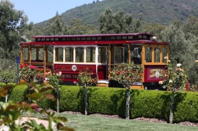 Feel the breeze on a sonoma valley open-air wine trolley tour with stops at 3 wineries, local guide stories, and lunch included. book your spot—ages 21+.