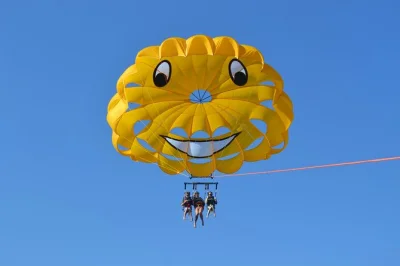 Feel the rush of destin parasailing as you glide 400 feet above emerald waters, with group options and safety-focused crew. includes all gear and easy check-in.