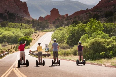 Feel the wind on a segway through garden of the gods, spot wildlife, hear local stories, and see kissing camels—guided tour with helmet and training included.