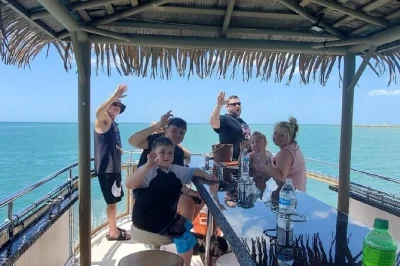 Laugh with friends, sip unlimited drinks, and spot dolphins on a coast guard-certified tiki boat tour in clearwater beach. includes all alcoholic beverages.