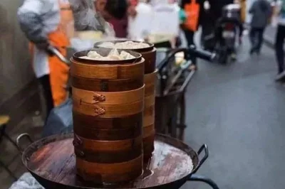 Wake up in shanghai’s french concession with a breakfast walking tour, over 15 local dishes, street vendors, and historic shikumen lanes—includes small group guide.