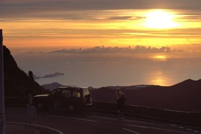 Watch sunrise above the clouds at pico do arieiro, ride off-road in a 4x4, enjoy a quiet forest walk, and stop for local coffee—includes pickup and expert guide.