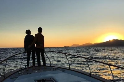 Feel the sea breeze on a private amalfi coast sunset cruise, sip prosecco & homemade limoncello, and relax with snacks as praiano glows in golden light. includes towels.