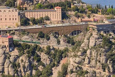 Feel the rush of montserrat’s cable car, taste local farmer market treats, and explore the monastery with priority access—small group tour from barcelona, guide included.