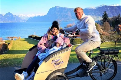 Feel the breeze as you ride an electric cargo bike through lucerne’s villages, enjoy a lakeside snack with mountain views, and learn swiss quirks from a local guide.