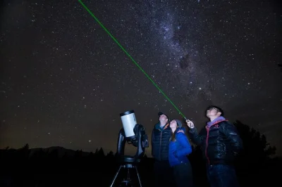 Feel the chill at lake tekapo, gaze through a powerful telescope, toast marshmallows by the fire, and take home starry photos—all with a local guide included.