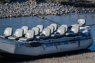 Float past the tetons on the snake river with high-back seats, binoculars for wildlife, bottled water, and a local guide. includes rain gear and all ages welcome.