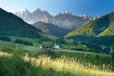 Ride through the dolomites with a private guide, stop in mountain villages, walk to a hut under sass putia & catch sunset at lake carezza. pickup included.