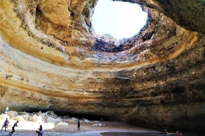 Feel the ocean breeze on a benagil caves & dolphins tour from vilamoura. includes wild dolphin watching, sea cave stops, and stories with your local guide.