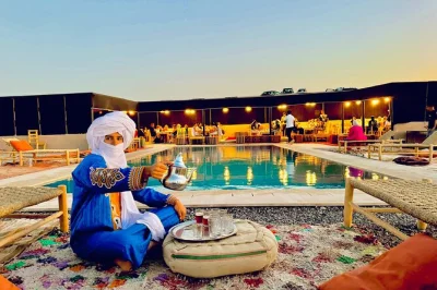 Ride quads and camels in agafay desert, then enjoy a berber dinner show. includes hotel pickup, guides, and sunset views. book your marrakech adventure.