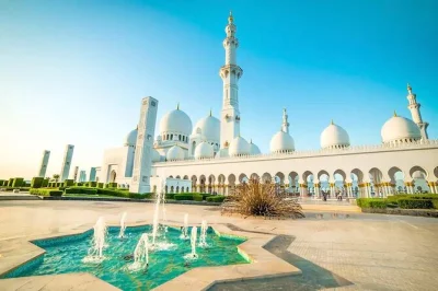 Explore abu dhabi’s grand mosque, emirates palace & heritage village in a shared 4x4 tour. includes corniche drive, date market stop & hotel pickup.