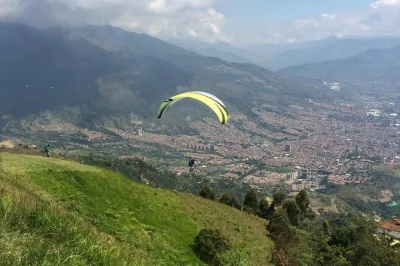Soar above medellin on a 20-minute paragliding flight. hotel pickup, certified instructors, and insurance included. multiple daily departures.