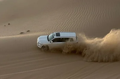 Experience a private abu dhabi morning desert safari with dune bashing, camel ride, sandboarding, and local refreshments. book your adventure now.