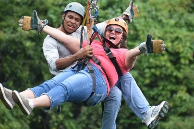 Fly across roatan’s jungle on 12 ziplines, cross suspension bridges, then relax at west bay beach. family-friendly zipline tour plus beach time included.
