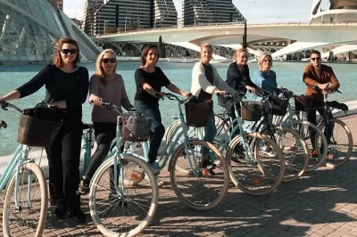 Explore valencia by bike with a private guide. visit turia gardens, city of arts & sciences, royal gardens, and the beach. water & bike included.