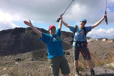 Hike two volcanoes near santa ana with a private guide, see active izalco’s crater, and walk through cloud forest. includes early departure and all park admissions.