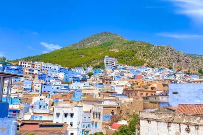Full-day private tour to chefchaouen from tangier. explore the blue medina, rif mountains, ras el-maa waterfall, with local guide & transport included.