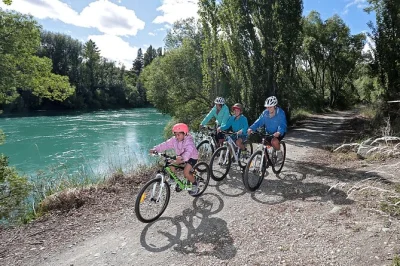 Explore central otago’s river trails by e-bike. ride from clyde to alexandra, enjoy local cafés, vineyards, and easy scenic cycling. book your loop ride now.