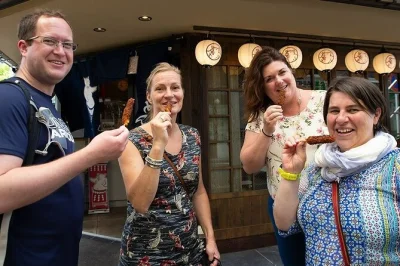 Scopri il miglior street food di nagoya nel vivace quartiere osu, visita santuari nascosti e ascolta la storia locale con una guida esperta. prenota ora: 5 assaggi inclusi più la lettura della fortun
