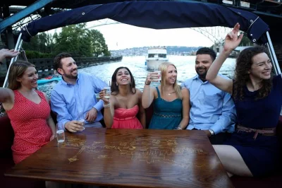 See seattle from the water on a lake union cruise with floating homes, space needle views, and local guide narration. small group boat tour includes byob option.