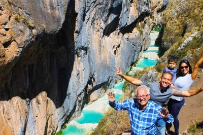 Swim in millpu’s turquoise pools, hike the canyon with a local guide, and enjoy private transport from ayacucho. includes pickup—book your spot now.