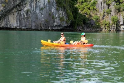 Experience lan ha bay’s quiet lagoons, kayak hidden tunnels, bike through viet hai village, and enjoy fresh local meals. includes pickup and guide.