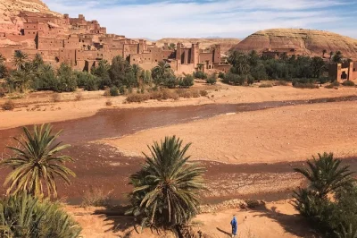 Travel from marrakech to ouarzazate and ait benhaddou with a local guide. includes hotel pickup, mountain drive, and lunch overlooking the kasbah. book now.