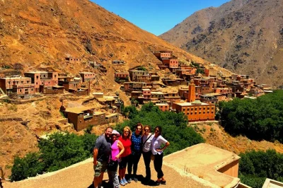 Experience the atlas mountains, trek through berber villages, ride camels by the moulay ibrahim river, and enjoy a traditional lunch. includes pickup.