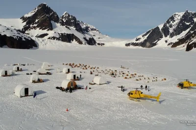 Fly over juneau’s glaciers by helicopter, land on herbert glacier for a real dogsled ride with huskies, and meet mushers. includes pickup and gear.