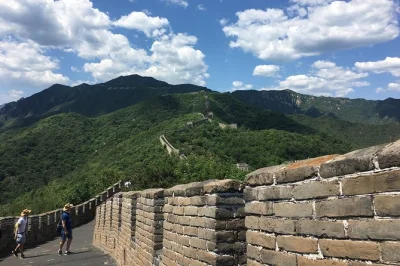 Walk the mutianyu great wall with a local driver, ride the cable car, and try the toboggan down. includes hotel or airport pickup and flexible timing.