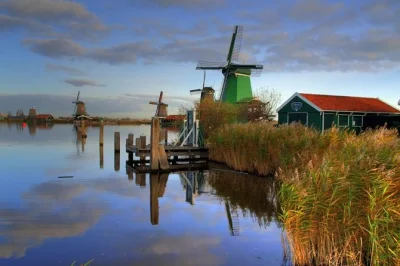 Step inside zaanse schans windmills, taste dutch cheese in volendam, and watch clogs made by hand on this small-group tour from amsterdam. includes tastings and pickup.