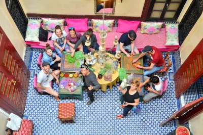 Cook authentic moroccan dishes in a fes home. shop the souk, prepare tagine, and share mint tea with locals. hands-on culinary experience in morocco.