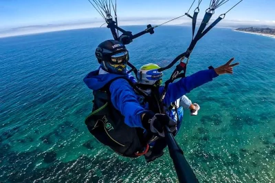 Fly tandem over maitencillo with a local instructor. experience the coast from above, includes all equipment. book your paragliding adventure today.