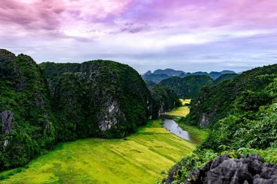 Experience ninh binh’s ancient temples, river boat ride in tam coc, and a sunset swim. includes hotel pickup from hanoi and local guide. book now.