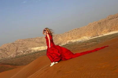 Feel the thrill of dubai’s desert with dune bashing, camel rides, sand boarding, live belly dance and fire shows, plus a bbq dinner. includes pickup from your location.